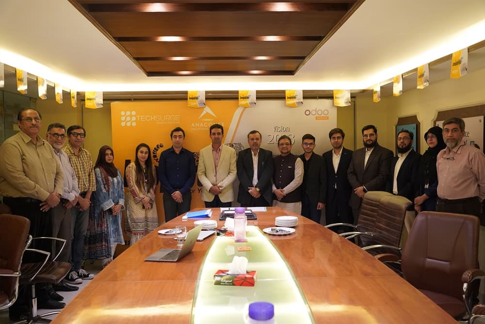 Techsurge and Leopard Courier teams at the partnership signing